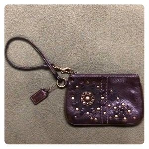Coach brown leather studded wristlet